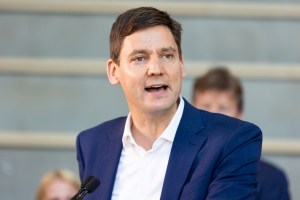 David Eby speaks at a press conference at SFU's Surrey campus in July.