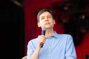 Premier David Eby, here seen in July, used a media appearance Tuesday to acknowledge that ER closures in rural B.C. contributed to his party's performance in the B.C. election.