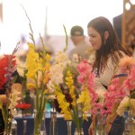 People look at floral displays during the 153rd annual Chilliwack Fair at Chilliwack Heritage Park on Saturday, Aug. 9, 2025.