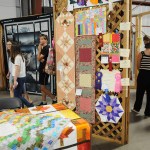 Folks check out quilts on display during the 153rd annual Chilliwack Fair at Chilliwack Heritage Park on Saturday, Aug. 9, 2025.