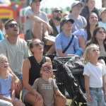 Folks watch the Extreme Loggers show during the 153rd annual Chilliwack Fair at Chilliwack Heritage Park on Saturday, Aug. 9, 2025.