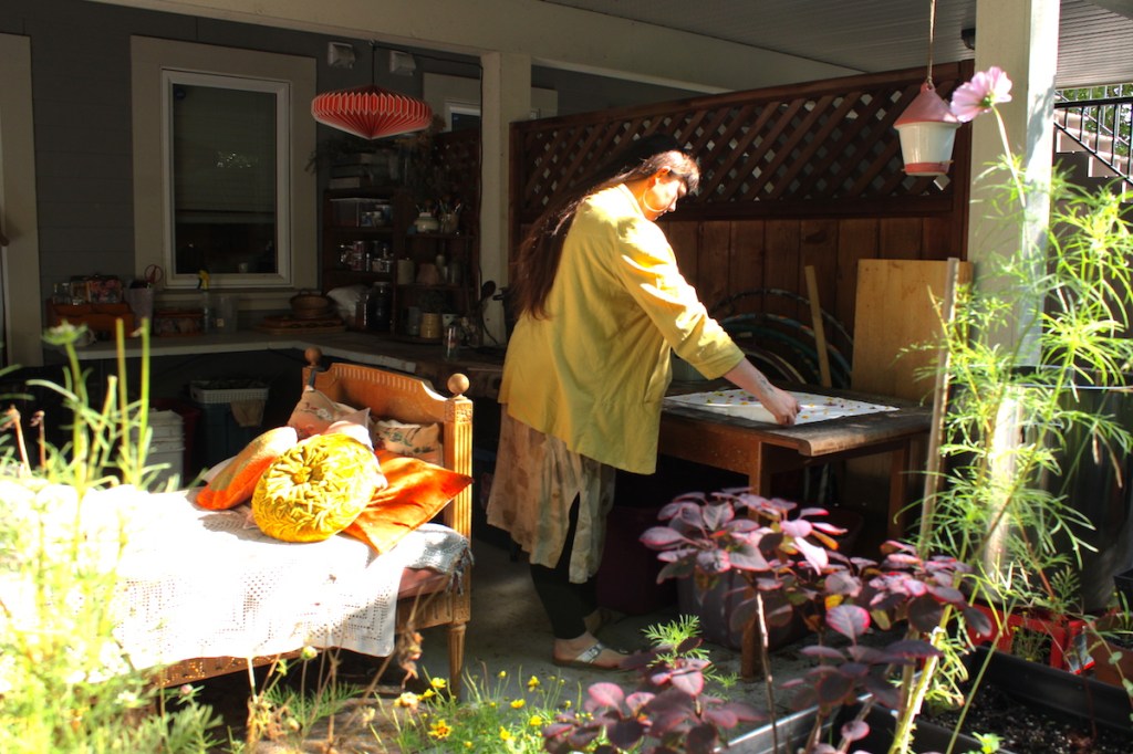Carly Stefanowich at her patio workspace.