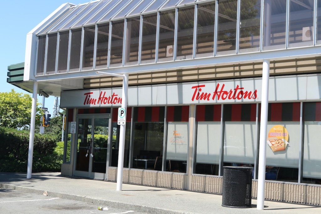 In a video shared online, a person can be seen striking a youth several times at Tim Hortons, 3501 Ravine Way in Saanich.