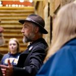 Chris Adams shares some of Victoria’s darker tales during a Ghostly Walks tour through downtown.