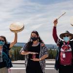 Destiney Michelle (centre), her mother, Hereditary Chief Helen Michelle (left), and fellow advisor, Pius Charlie, share their culture and traditional knowledge with workers.