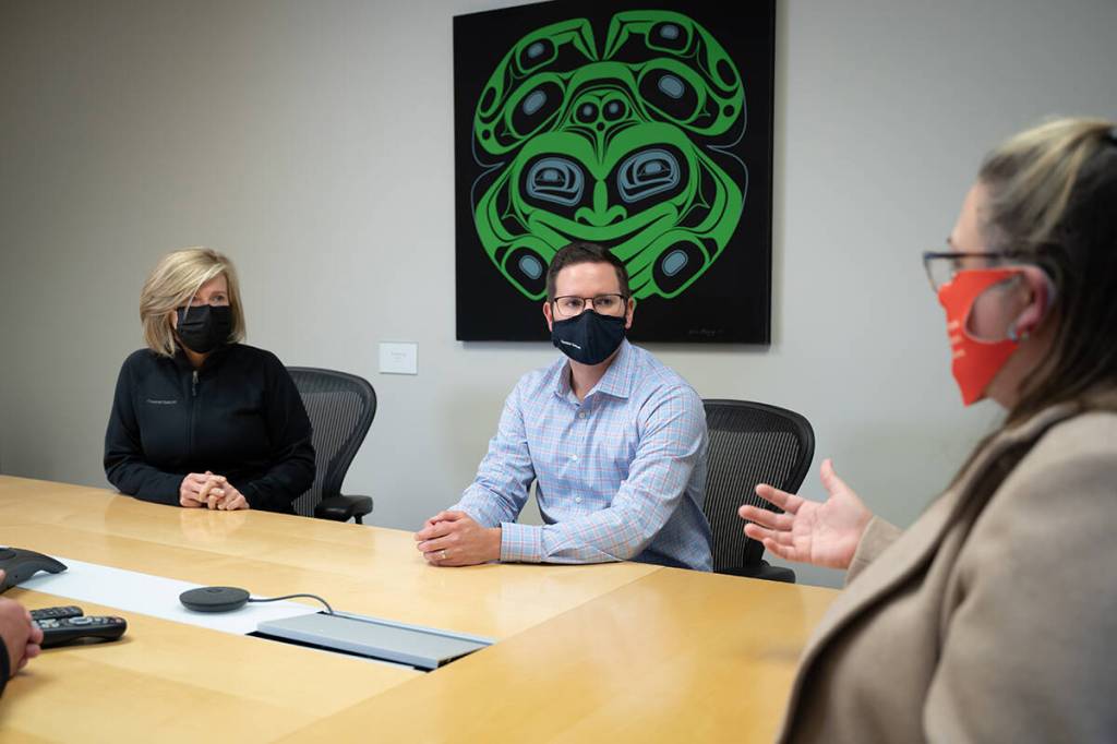 Coastal GasLink president Tracy Robinson (left) and public affairs manager Kiel Giddens (centre) meet with Trista Spencer at TC Energy’s Prince George office.