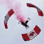 The SkyHawks, the Canadian Army Parachute Demonstration Team, kick off the show with a patriotic skydiving areal ballet.