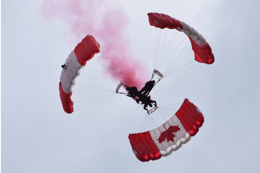 The SkyHawks, the Canadian Army Parachute Demonstration Team, kick off the show with a patriotic skydiving areal ballet.