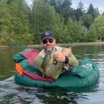 Mark Pavesic reels in a small mouth bass from Elk Lake, near Victoria, BC. Kelsey Pavesic photo