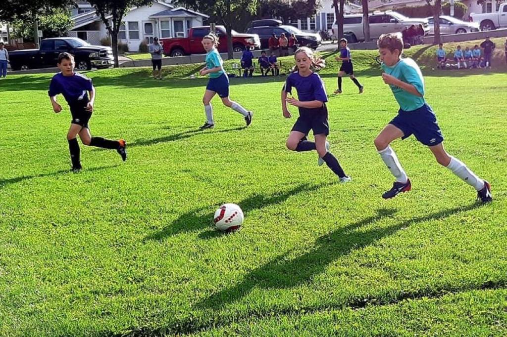 A U-13 match in the South Cariboo Minor Soccer Association in June 2019. The 2023 soccer season will have to be cancelled unless more volunteers are found. (Photo credit: Deanna Hayes)