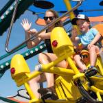 Mother and child on the Flutterbye ride at the PNE fair. (File photo)