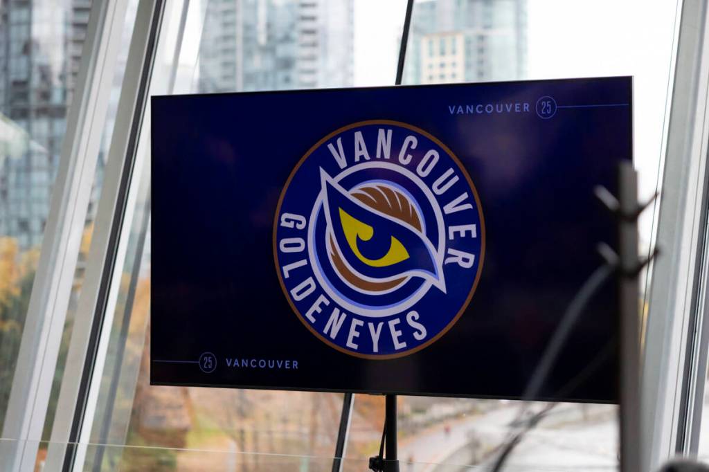 Vancouver Goldeneyes players after the team revealed its new team name and logo in an event at a Cactus Club in Vancouver on Thursday, Nov. 6. (Anna Burns/Surrey Now-Leader)