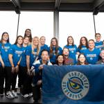 Vancouver Goldeneyes players pose for a photo alongside Vancouver mayor Ken Sim and city councillors, at the logo and team name reveal event at a Cactus Club in Vancouver on Thursday, Nov. 6. (Anna Burns/Surrey Now-Leader)