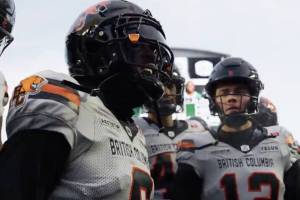 B.C. Lions players T.J. Lee, left, and Nathan Rourke urge on their teammates during the CFL&rsquo;s Western Final on Saturday, Nov. 8, 2025 at Mosaic Stadium in Regina. (https://x.com/BCLions photo)