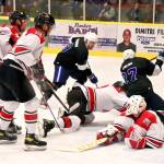 The Hazelton Wolverines (white) and Terrace River Kings mix it up in front of the Wolverines&rsquo; net in Central Interior Hockey League action on Nov. 15 in Terrace. (Terrace River Kings)