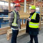 Chris Kalesnikoff (L) gave energy minister Tim Hodgson (R) a tour of the Castlegar facility on Nov. 10. (Betsy Kline/Castlegar News)