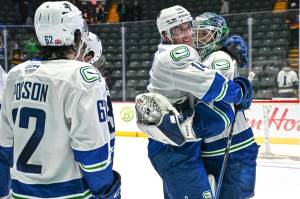 Wednesday&rsquo;s (Nov. 12) heroes Aku Koskenvuo and Joseph LaBate embrace after the Abbotsford Canucks 4-3 shootout win over the San Jose Barracuda. The win snapped an 11-game losing streak. (Abbotsford Canucks photo)
