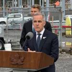 Prime Minister Mark Carney announces six new &lsquo;national-building&rsquo; projects slated for fast-tracking by the Major Projects Office at the BC Hydro Skeena Substation near Terrace on Nov. 13 as Minister of Housing and Infrastructure Gregor Robertson looks on. (Jake Wray/Black Press Media)