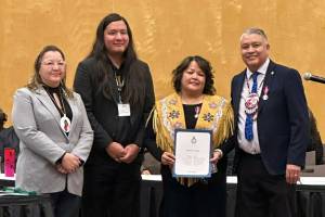 National Chief Cindy Woodhouse Nepinak, Kyle Luggi, Chief Maureen Luggi, and Regional Chief Terry Teegee gather following the presentation of the King Charles III Coronation Medal. Supplied photo