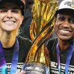 Nikki Stanton, left, and Jasyme Spencer pose for a photo with the Diana B. Matheson Cup at BMO Field in Toronto, Saturday (Nov. 15). (Northern Super League/ Facebook)