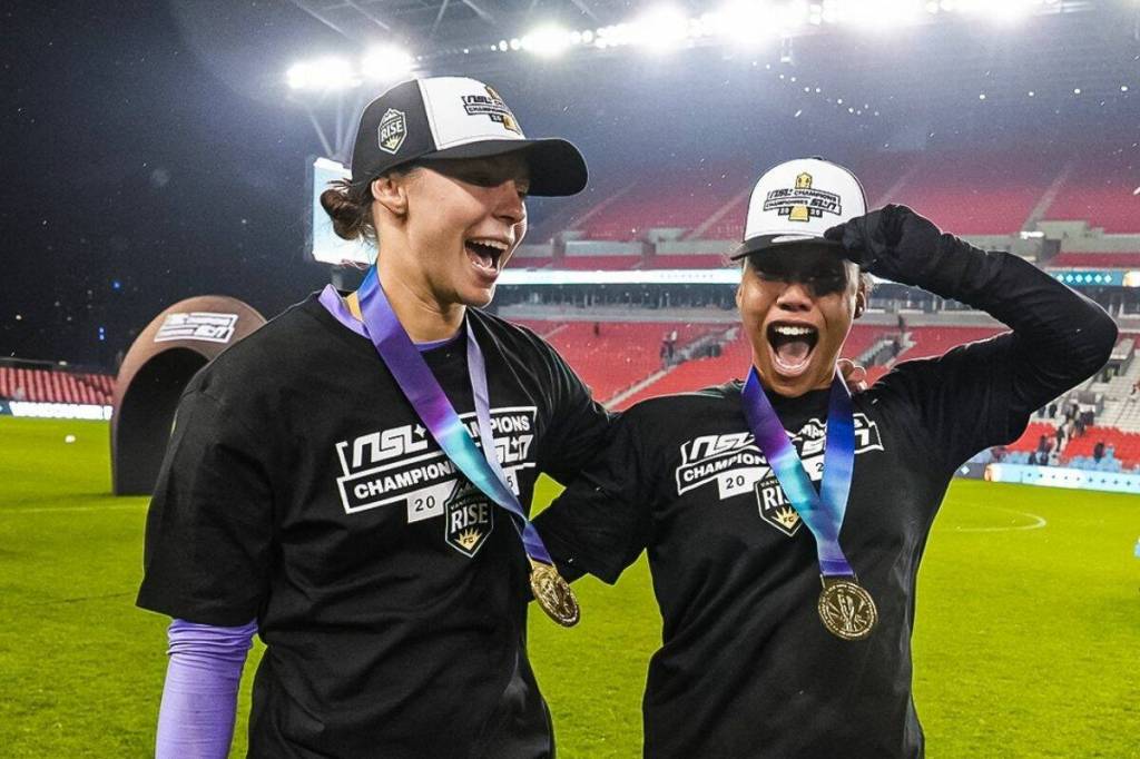 Morgan McAsland, left, and Jessika Cowart celebrate after winning the Diana B. Matheson Cup at BMO Field in Toronto, Saturday (Nov. 15). (Northern Super League/ Facebook)