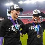 Morgan McAsland, left, and Jessika Cowart celebrate after winning the Diana B. Matheson Cup at BMO Field in Toronto, Saturday (Nov. 15). (Northern Super League/ Facebook)