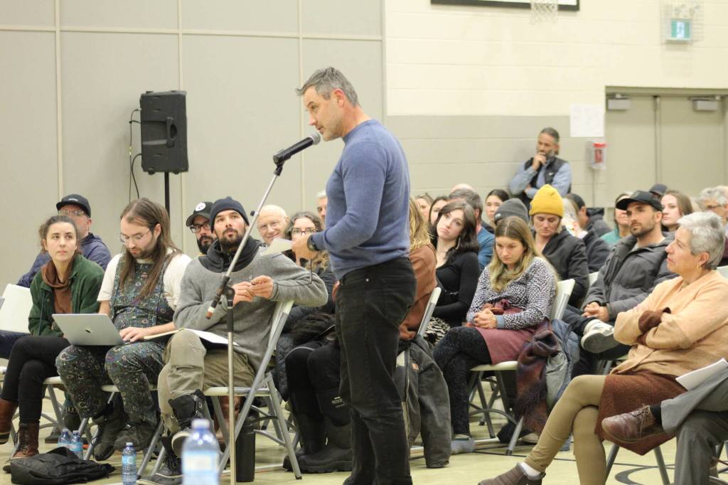 Dr. Wouter Morkel stands to speak at the special open meeting of council on Nov. 17 to oppose the location of the newly opened temporary shelter on Third Ave. (Marisca Bakker/The Interior News)
