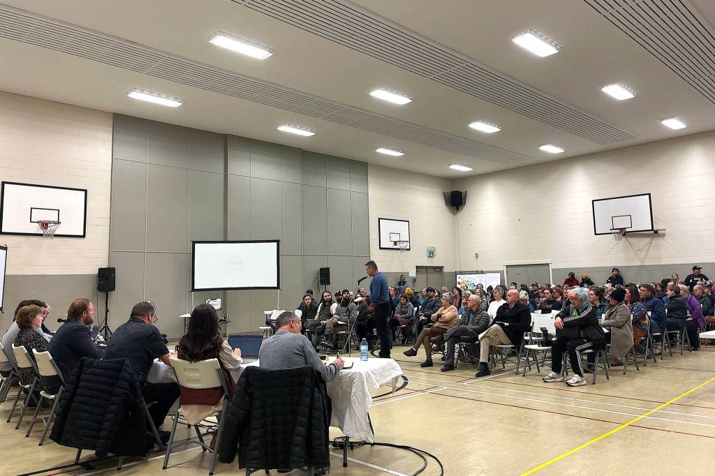Dr. Wouter Morkel stands to speak at the special open meeting of council on Nov. 17 to oppose the location of the newly opened temporary shelter on Third Ave. (Marisca Bakker/The Interior News)