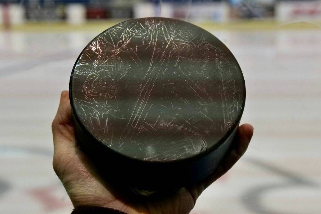 The puck, which costs $40 US, is made of metal and is three times the size of a regular hockey puck. Ball bearings inside help it make noise and light the way. (Tony Trozzo/Victoria News)