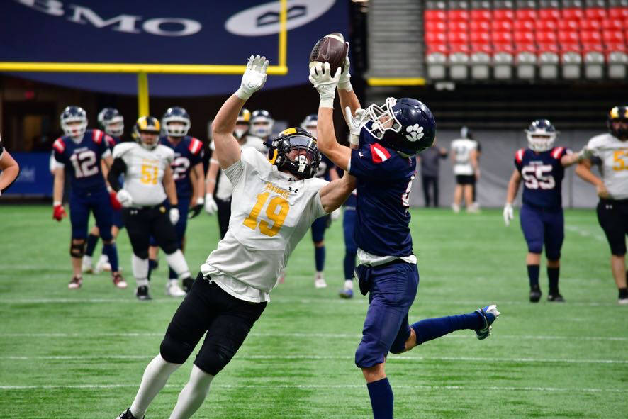 Vernon Panthers receiver Nash Steele (right) hauls in a touchdown pass over Victoria&rsquo;s Mt. Douglas Rams defender Jake Piasta during the Panthers&rsquo; 45-7 B.C. High School AA Senior Varsity football semifinal Sunday, Nov. 23, at BC Place Stadium in Vancouver. (Darren Hove photo)