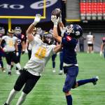 Vernon Panthers receiver Nash Steele (right) hauls in a touchdown pass over Victoria&rsquo;s Mt. Douglas Rams defender Jake Piasta during the Panthers&rsquo; 45-7 B.C. High School AA Senior Varsity football semifinal Sunday, Nov. 23, at BC Place Stadium in Vancouver. (Darren Hove photo)