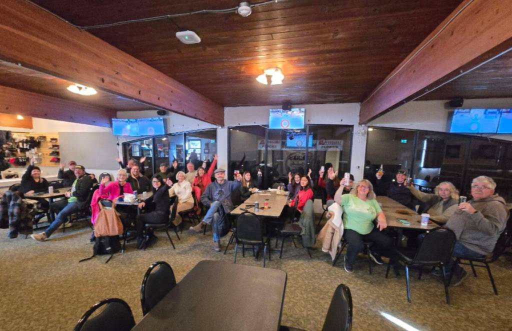 The team felt tremendous home-town support, with a group getting together to watch the final game at the Kimberley Curling Club and greeting them when they arrived at the airport. (Kimberley Curling Club/Submitted)