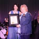 Surrey-raised musician Lisa Brokop, left, with Surrey Mayor Brenda Locke during with City of Surrey proclamation of Lisa Brokop Day during her &ldquo;Hometown Hall of Fame&rdquo; concert Monday, Nov. 24, 2025, at Shannon Hall in Cloverdale. (Contributed/Rick Chapman, City of Surrey)