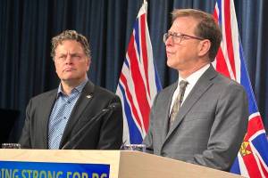 Energy and Climate Solutions Minister speaks alongside B.C. Green MLA Jeremy Valeriote. The B.C. Greens worked with the government to review Clean B.C. (Mark Page/Black Press Media)