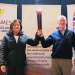 Trail Mayor Colleen Jones and Rossland Mayor Andy Morel share in the excitement of counting down to the 2026 BC Winter Games at the torchlighting event in the Trail Memorial Centre. (Jim Bailey/Trail Times)