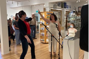 Smithers town councillor Sam Raven and Art Gallery manager Nicole Chernish took the stage by storm, belting out a rendition of 'Sweet Caroline' to celebrate the highly-anticipated exhibition of Kevin Ei-ichi deForest's show "The Same Sweetness" on July 15.