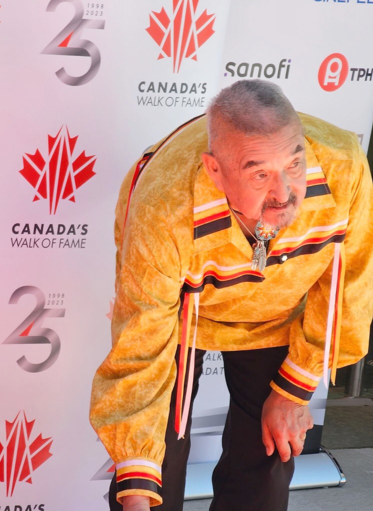 Graham Greene places his hand in his Canada Walk of Fame Star.