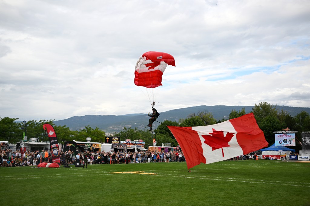 The Skyhawks Parachute Team at the 2025 Peach Fest opening ceremonies on Aug. 6 in Penticton.