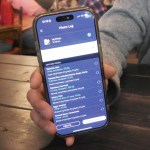 Cronometer product team manager Brendan Benson shows the app's newest feature, a meal scanner for assessing nutritients, at Revelstoke's Flourish Bakery on Friday, Sept. 26.