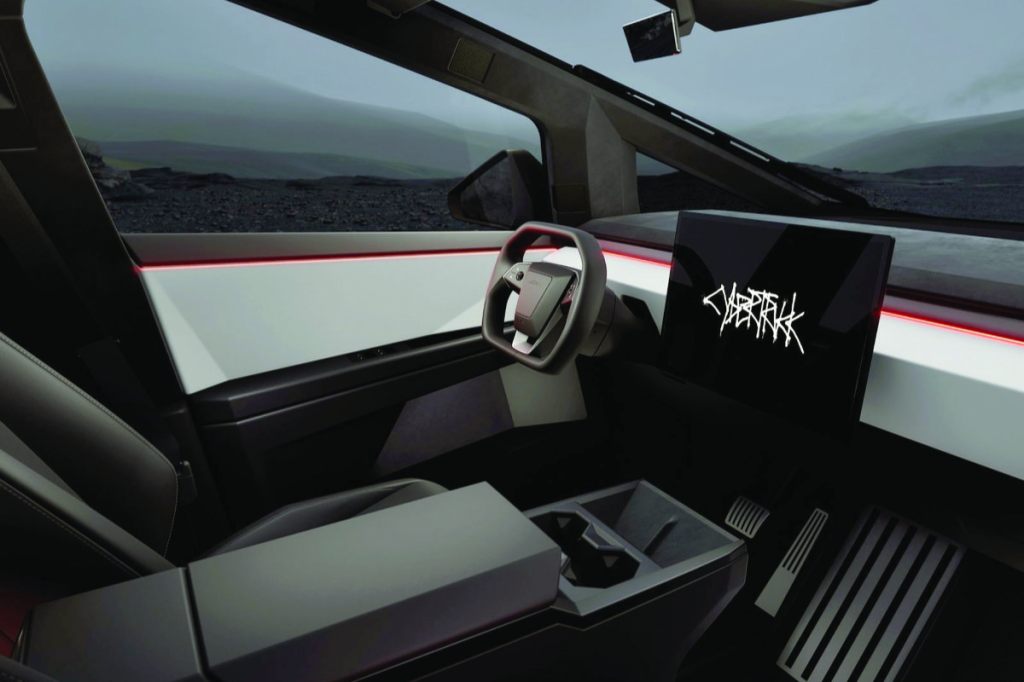 The Cybertruck’s sparse interior has little more than a giant 18.5-inch display and a 9.4-inch screen behind the centre console for rear-seat riders. PHOTO: TESLA