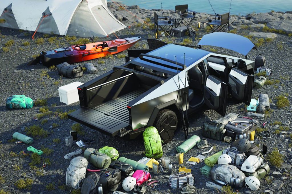 All this fits into or on top of the Cybertruck. The angular shape of the vehicle cleverly disguises the four-foot-by-six-foot bed, complete with power-operated tailgate.  PHOTO: TESLA