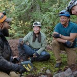 (left to right) Kru Williams, Taylor Starr, Don Froese and Adam Palmer of 'Deadman's Curse' gather in the Harrison Lake area to discuss their latest findings in the hunt for Slumach's gold.