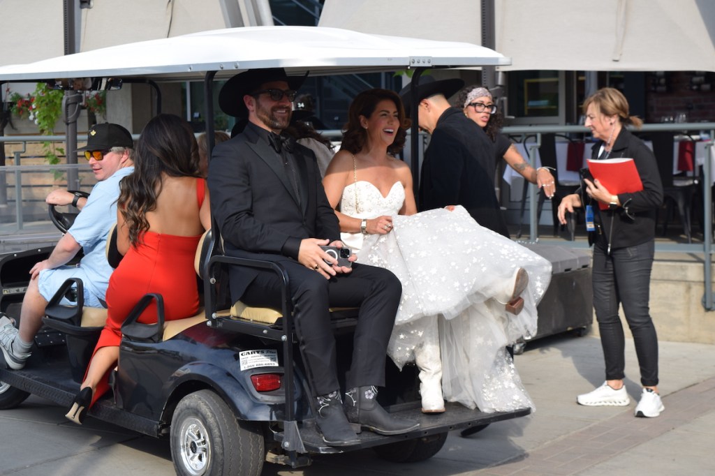 Jillian and Justin Pasutto hitching a ride from the red carpet to Propsera Place for the CCMA Awards.