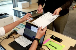 A sample voter card being used to demonstrate the voting process before the use of a new electronic tabulator people can expect to see in most voting areas during this year's provincial election during a press conference at the Elections BC office in Victoria, B.C., on Wednesday, September 25, 2024.