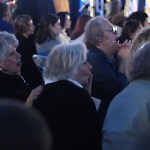 Surrey-Serpentine candidate Linda Hepner, centre, cheered on by supporters at the Conservative party of B.C. headquarters in Vancouver Saturday, Oct. 19, 2024. She is shown to be in the lead.