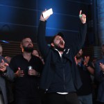 Conservative Party of B.C. supporters cheer on candidates as they're shown to be in the lead during the election night party in Vancouver on Saturday, Oct. 19, 2024.