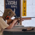 A young shooter is getting ready to fire a rifle downrange. Harry Corro/Peninsula News Review