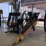 A cannon and several other historical firearms.