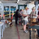 Bay 1 features historical guns.