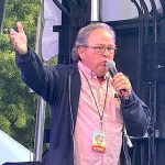 Festival producer John Donnelly speaks to the crowd at Barnside Harvest Festival in Ladner on Saturday, Sept. 13, 2025.